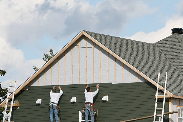 Professional Siding Installation technician working in Maysville, GA